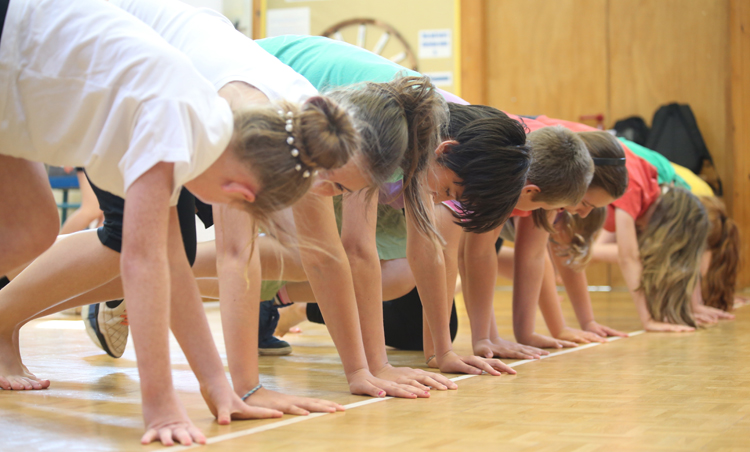 kids lined up to do exercise